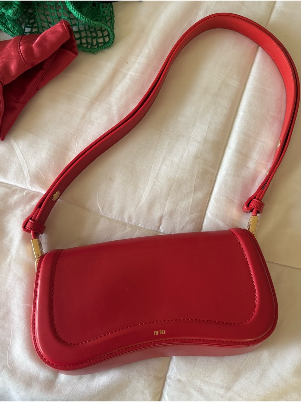 JW PEI Red Curved Vegan Leather Crossbody Bag